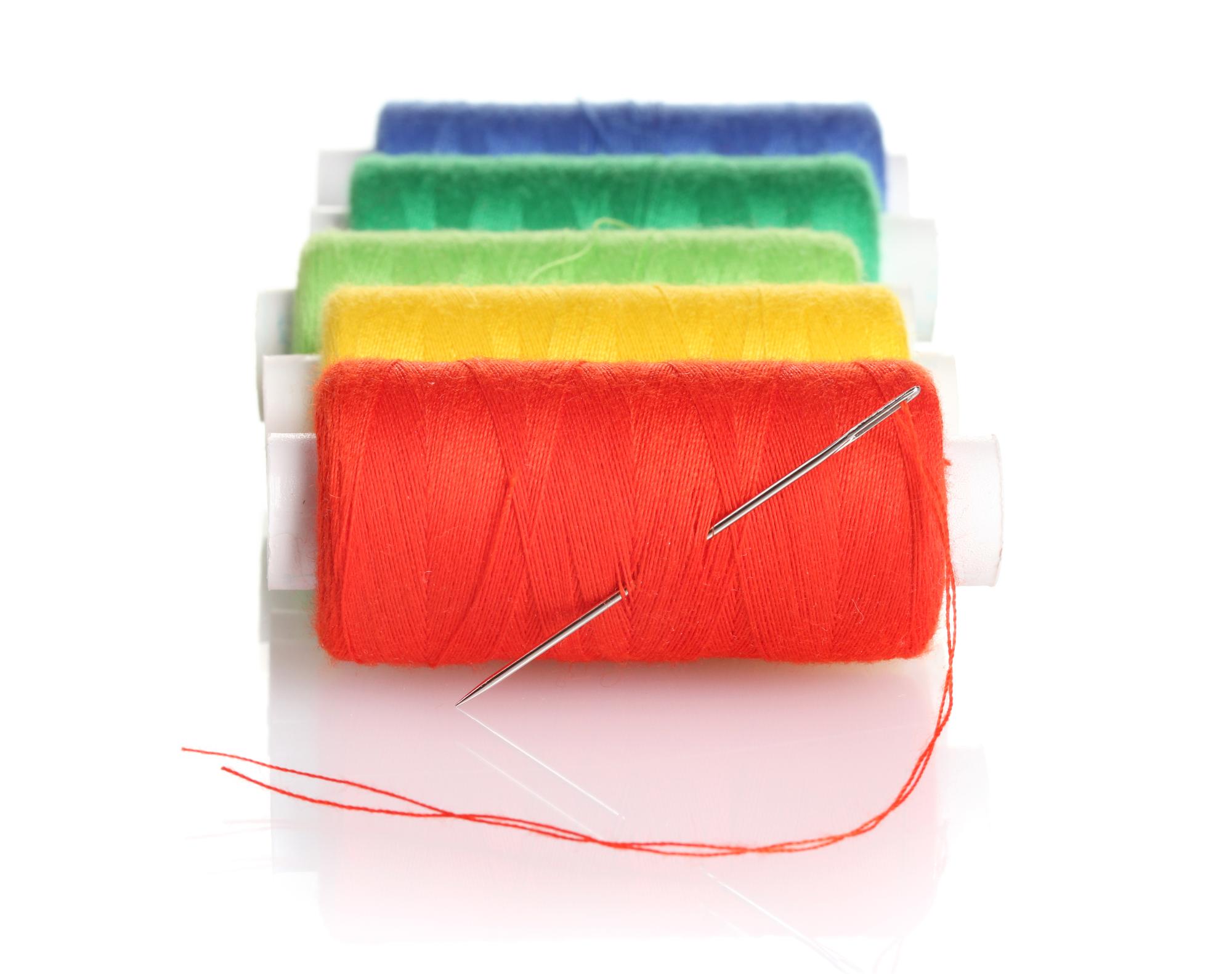 close-up of needlework and color palette
